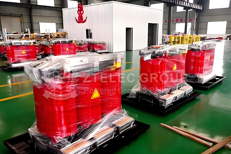 Technician testing dry-type transformer parameters with measuring equipment